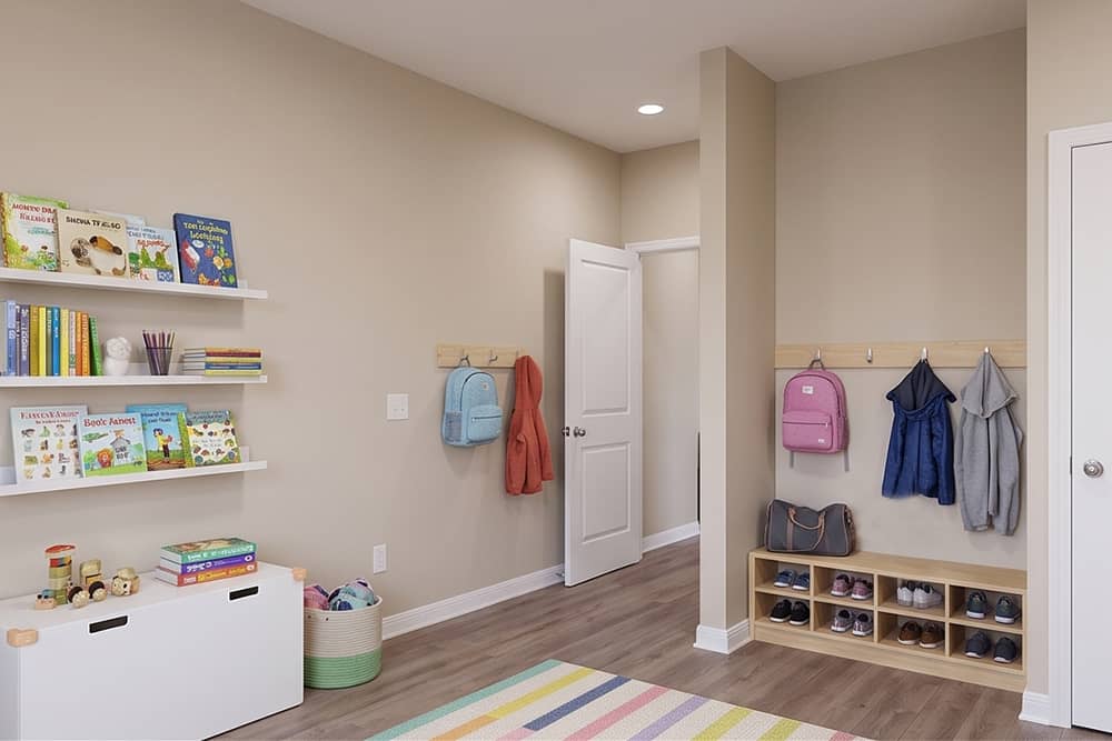 Mudroom with shoe cubbies and backpack hooks designed for busy families at Wild Horse Estates