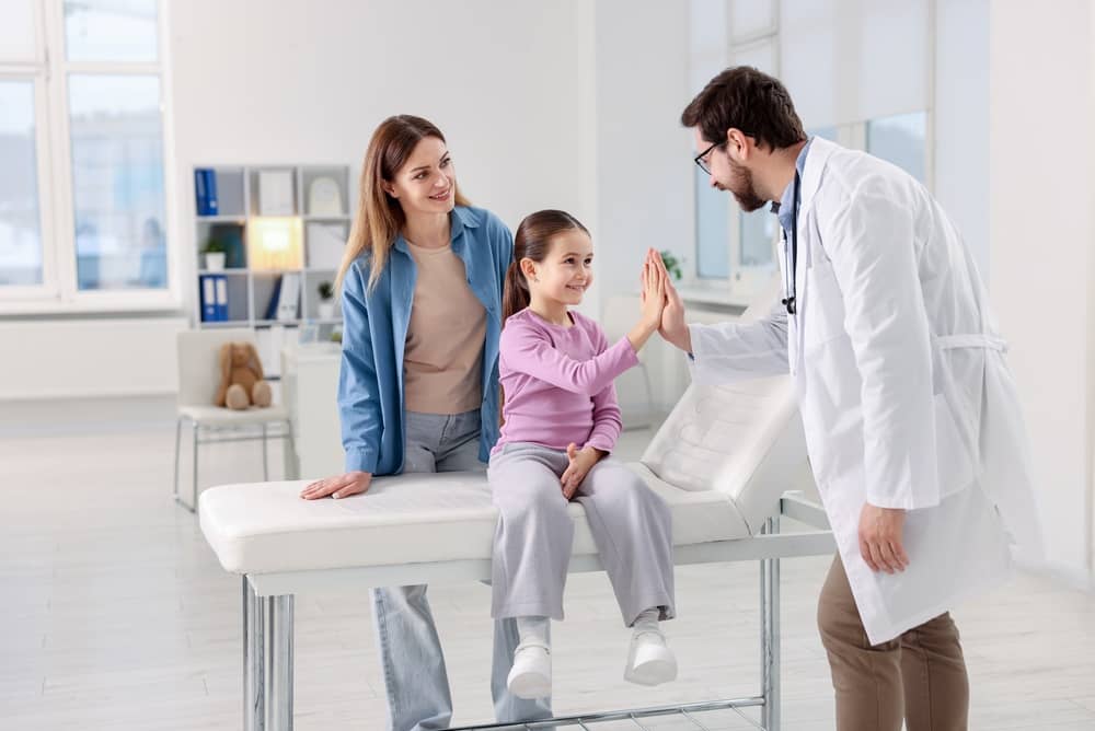Jobs in Tyler TX - healthcare employer team with patient family at Tyler hospital